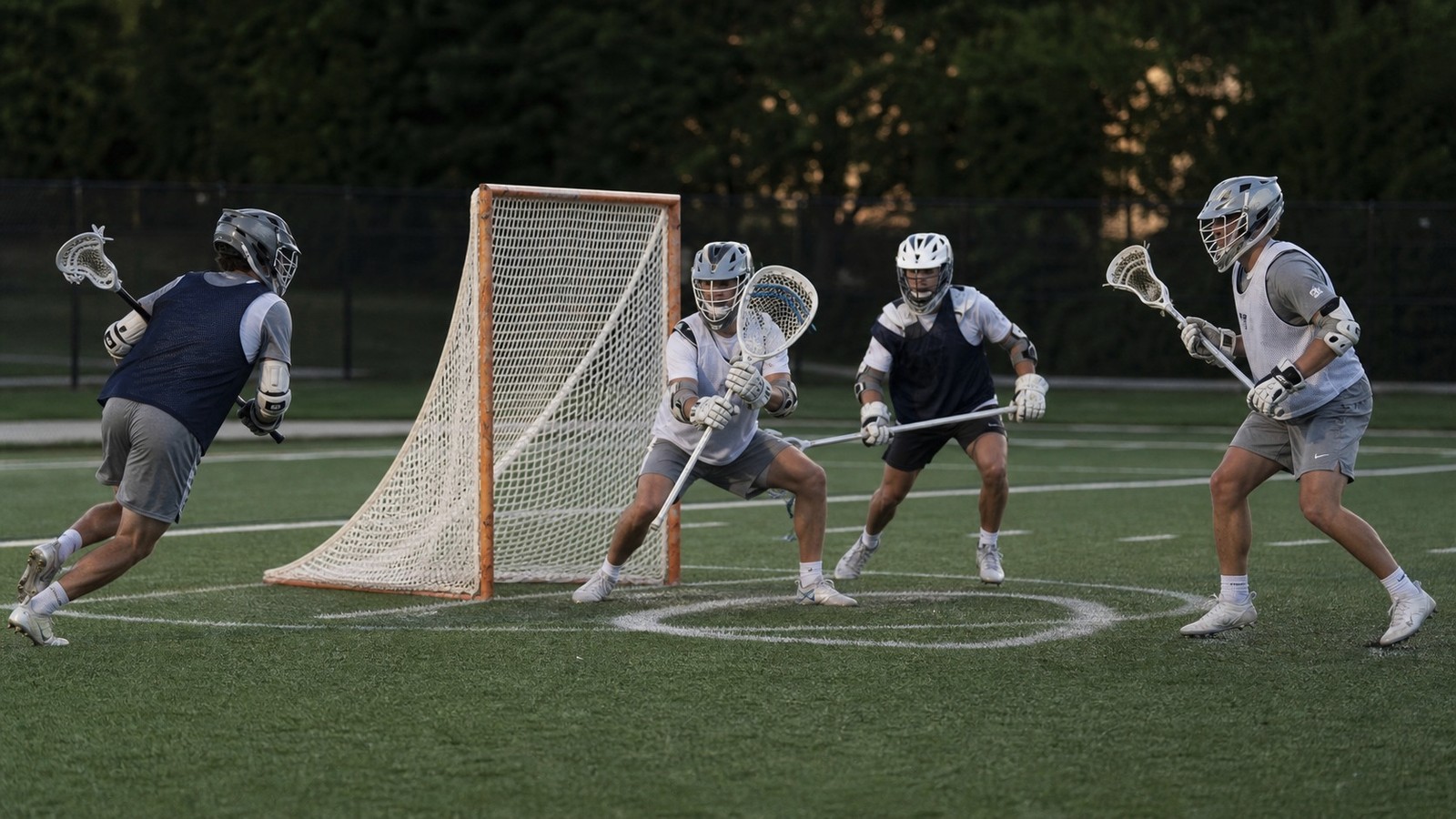 Lacrosse players demonstrating concepts from How Physical Play Shapes Box Lacrosse Strategy