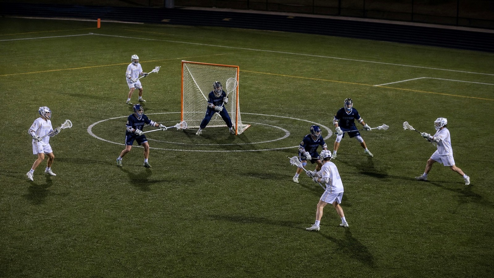 Lacrosse players demonstrating concepts from Shot Selection Differences in Box vs Field Lacrosse